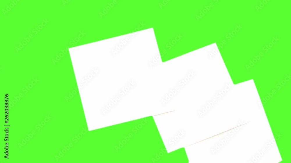 note paper sticks falling on green screen surface