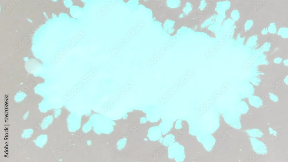 Beautiful Spreading White Green Ink Drops on Gray Wet Smooth Surface. Beautiful Spreading White Green Ink Drops on Gray Wet Smooth Surface.