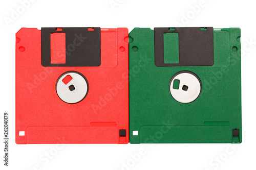 Floppy disks isolated on white background. Green and red floppy disks