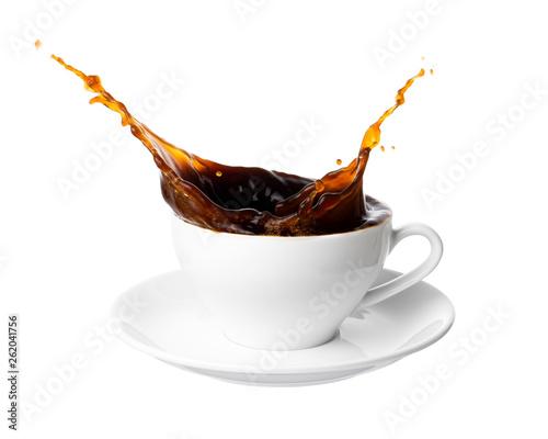 Black coffee splash out of a cup isolated on white background.