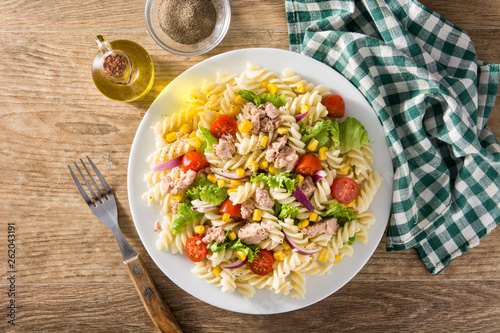 Bilde på lerret Pasta salad with vegetables and tuna on wooden table. Top view