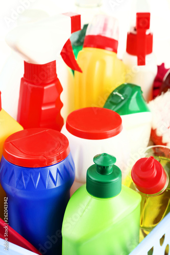 Bottles with detergent in basket