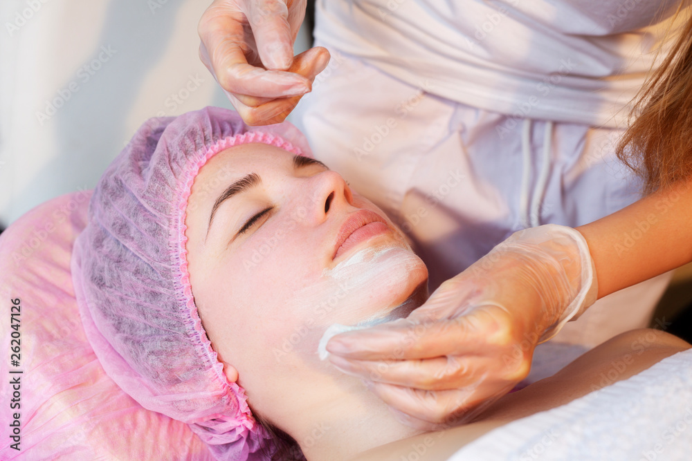Woman in spa salon lying down and enjoy relaxing in the day spa. Different treatments at the spa Woman in spa salon lying down and enjoy relaxing in the day spa. Different treatments at the spa