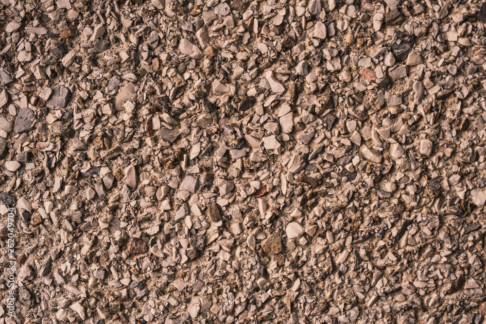 Grunge texture of crushed stone, cracked concrete and old asphalt Grunge texture of crushed stone, cracked concrete and old asphalt