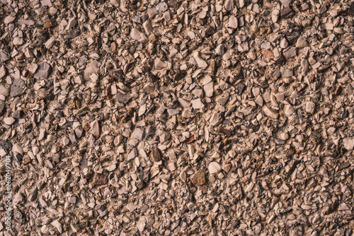 Photos Grunge texture of crushed stone, cracked concrete and old asphalt