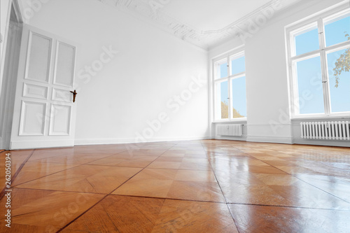 empty room, new flat old building with wooden parquet floor