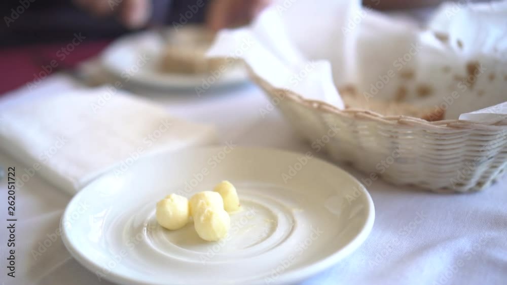 Eating fresh bread and butter in bright morning breakfast food Eating fresh bread and butter in bright morning breakfast food
