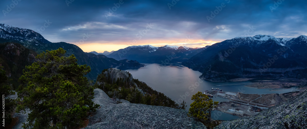 Scenic Panoramic Landscape view of the Beautiful Canadian Nature from the top of the Mountain during  a colorful sunset. Taken in Squamish, North of Vancouver, BC, Canada.