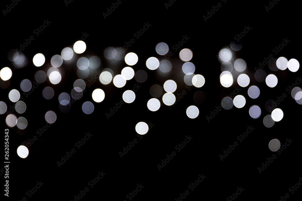 Bokeh white lights on black background, defocused and blurred many round  light on background Stock Photo | Adobe Stock