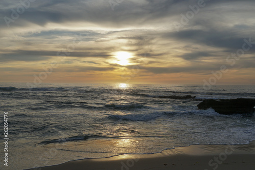 Beautiful colorful sunset over the sea  clouded sky on twilight time and reflection on the sea. in La Jolla  San Diego  California  USA