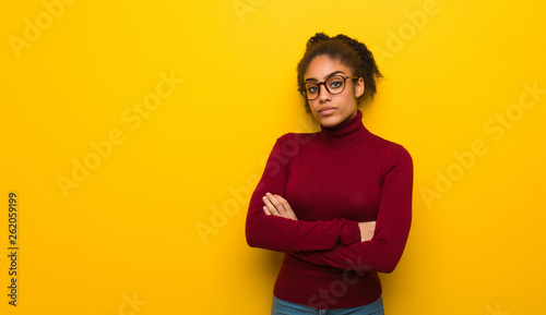 Slika na platnu Young black african american girl with blue eyes looking straight ahead