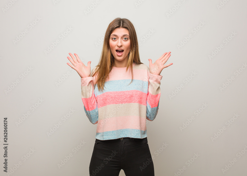 Young russian girl celebrating a victory or success Young russian girl celebrating a victory or success