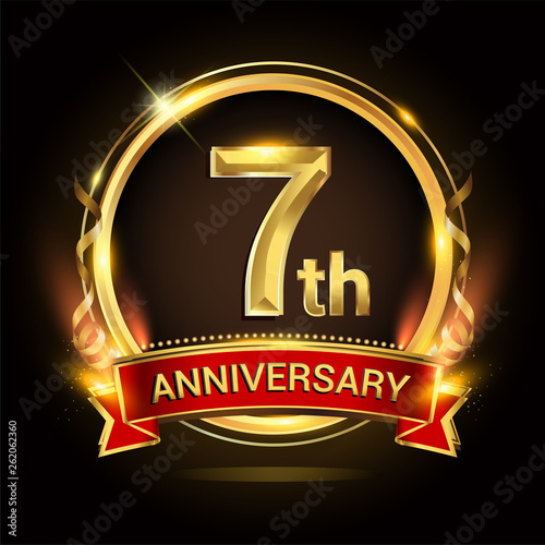 7th golden anniversary logo with ring and red ribbon, vector design.