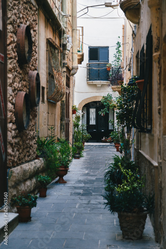 Beautiful view of narrow medieval street in Mdina  ancient capital of Malta  fortified medieval town. Popular touristic destination and attraction