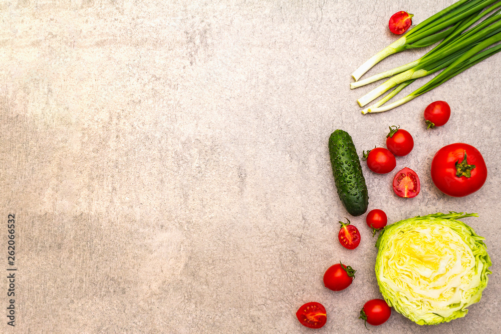 Assortment fresh organic vegetables. Food cooking stone background. Healthy vegetarian (vegan) eating concept, top view, flat lay, copy space.