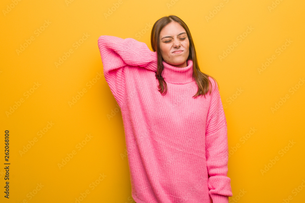 Young modern woman suffering neck pain Young modern woman suffering neck pain