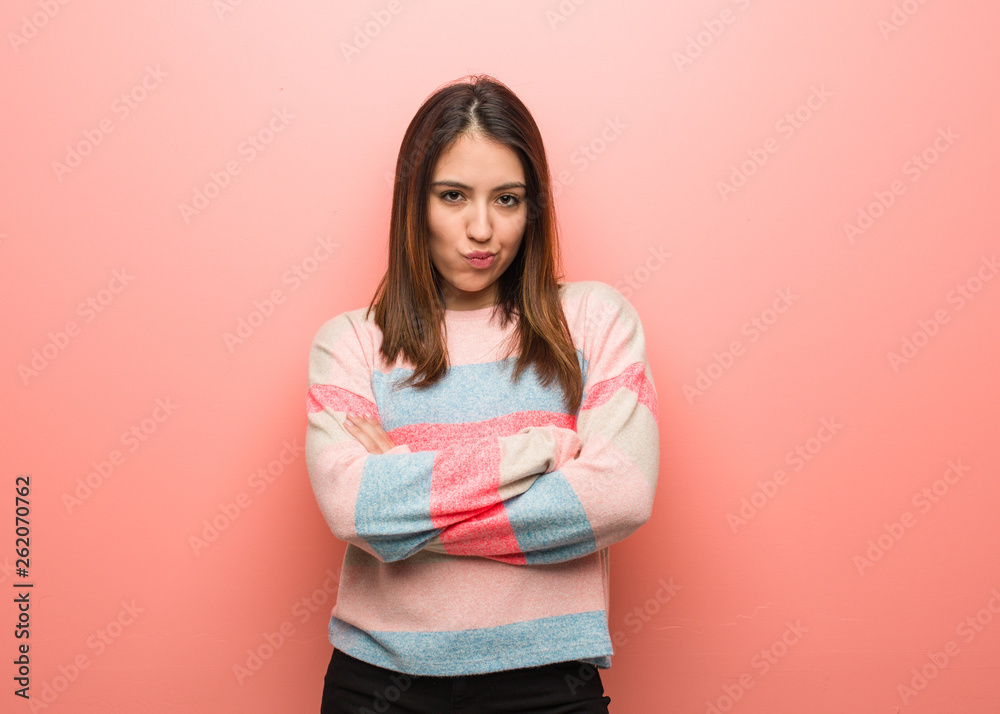 Young cute woman crossing arms relaxed Young cute woman crossing arms relaxed