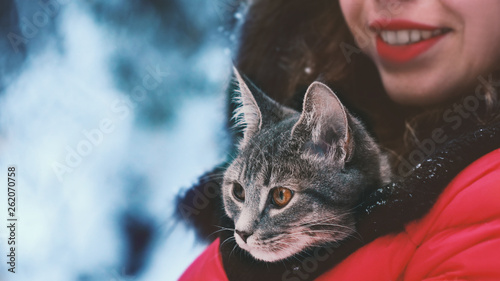 young woman with a cat