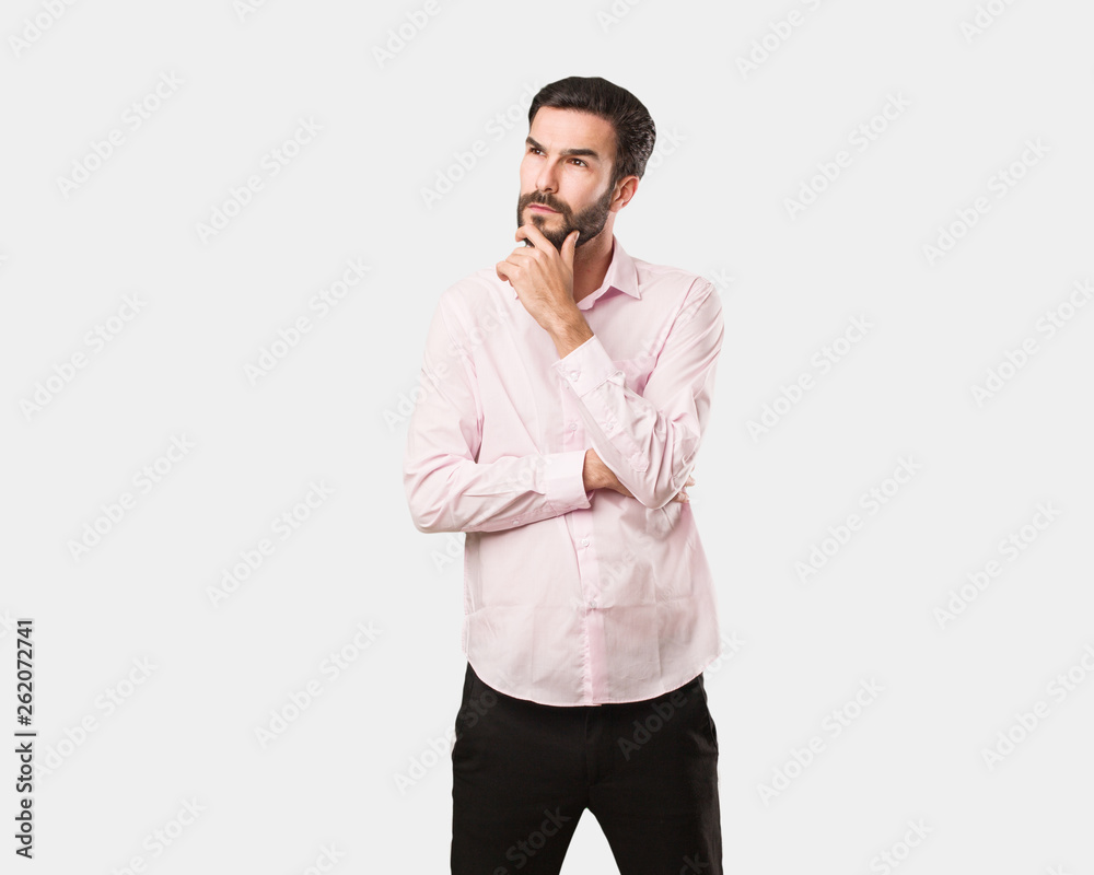 Young handsome man thinking about an idea Young handsome man thinking about an idea