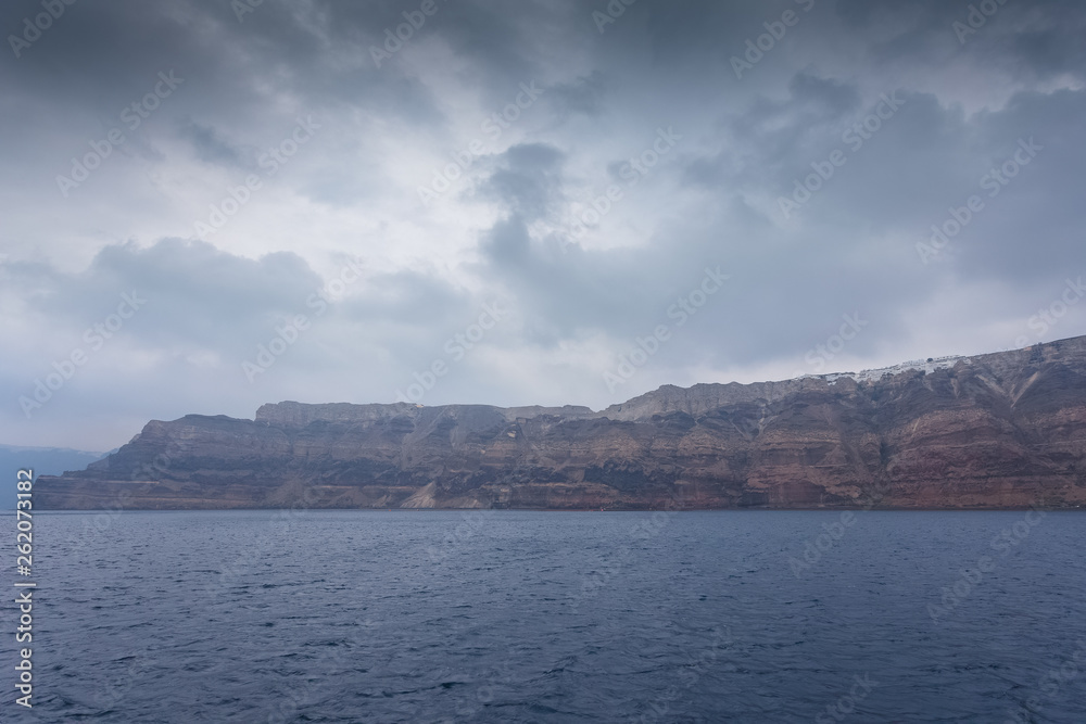 Panorama of the cliff of the caldera in the island of Santorini, Greece