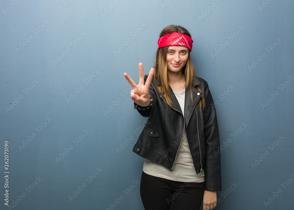 Young russian woman showing number three Young russian woman showing number three