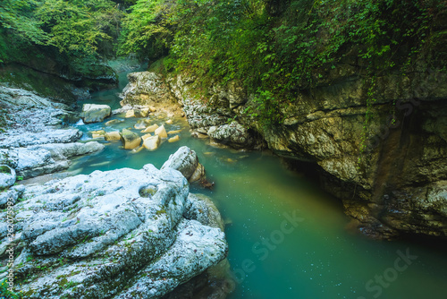 Large rocks and boulders along the river. Okatse Canyon. Rest in Georgia. Nature in the Imereti region. photo