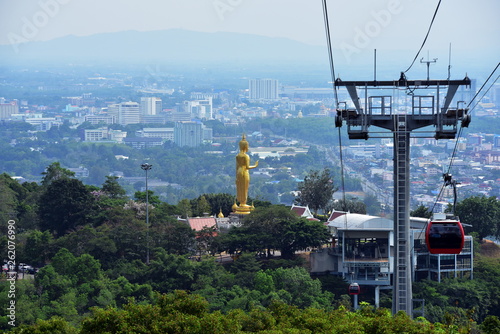 View of the sky-high cable car of Hat Yai, looking like a Buddha image and the city.	