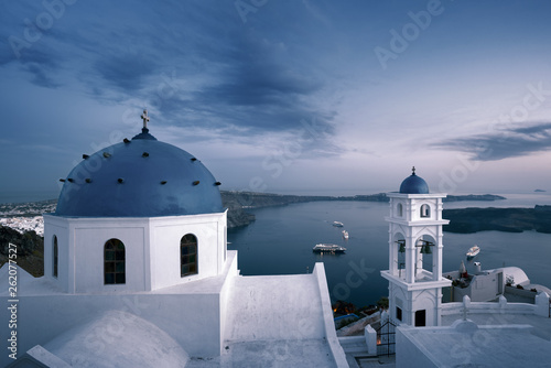 Greek orthodox church against sea bay in Santorini Greece