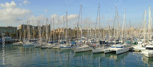 Barcelona harbour reflections shine on a winters day
