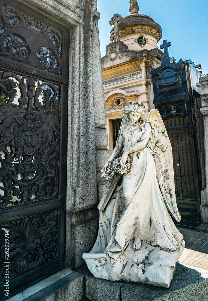 Obraz premium Buenos Aires, Argentina-03 Octubre, 2018: Famous La Recoleta Cemetery in Buenos Aires that contains the graves of notable people, including Eva Peron, presidents of Argentina, Nobel Prize winners