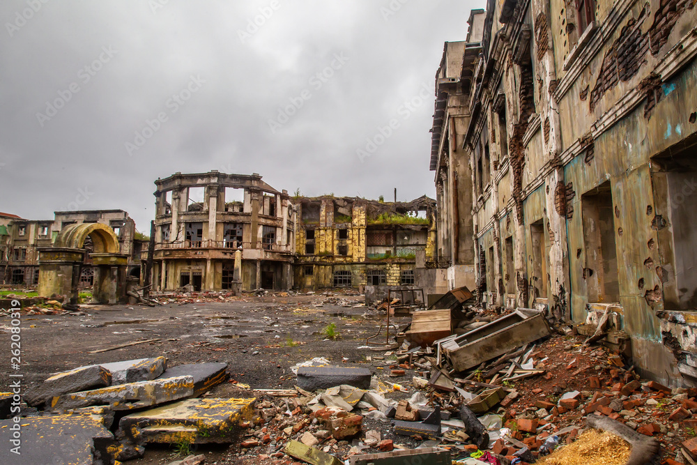 The city ruins after the war. Ruins of war. Broken city after the military  bombing. The bombed-out buildings. The wreckage of buildings. War  destruction. Stock Photo | Adobe Stock