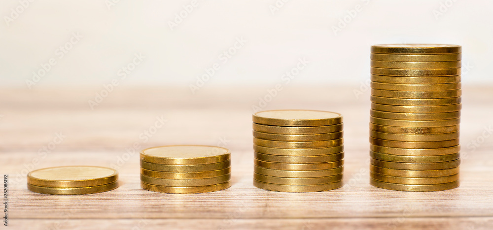 Financial planning concept, gold money coins growing, web banner idea Financial planning concept, gold money coins growing, web banner idea