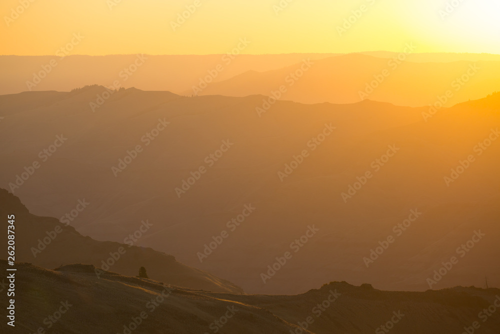 Summer sunrise over Joseph Canyon in northest Oregon. Summer sunrise over Joseph Canyon in northest Oregon.