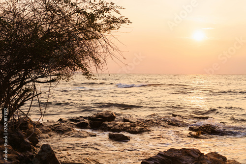 Beach sunset or sunrise with colorful of cloud sky and sunlight in twilight