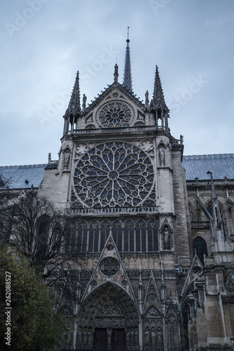 Notre Dame de Paris cathedral during the overcast day in Paris, France