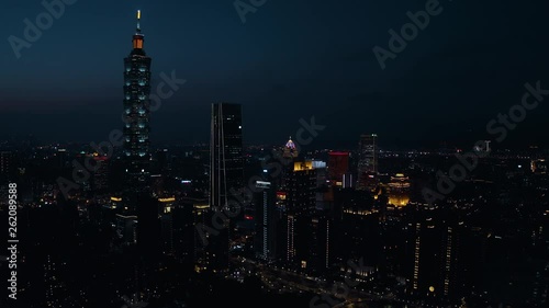 Wallpaper Mural 4k Aerial drone footage - Skyline of Taipei, Taiwan at night.   Torontodigital.ca