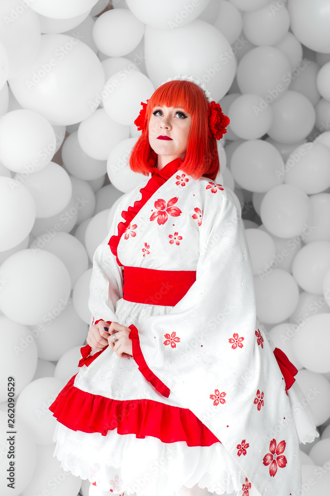 girl in kimano on the background of balls girl in kimano on the background of balls