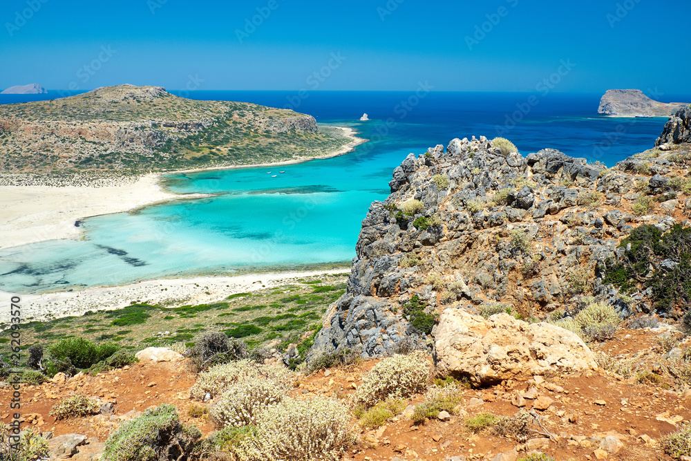 Gramvousa Castle and Laguna Balos, Crete. Beautiful beach with clear blue water. View of the island from the opposite shore.