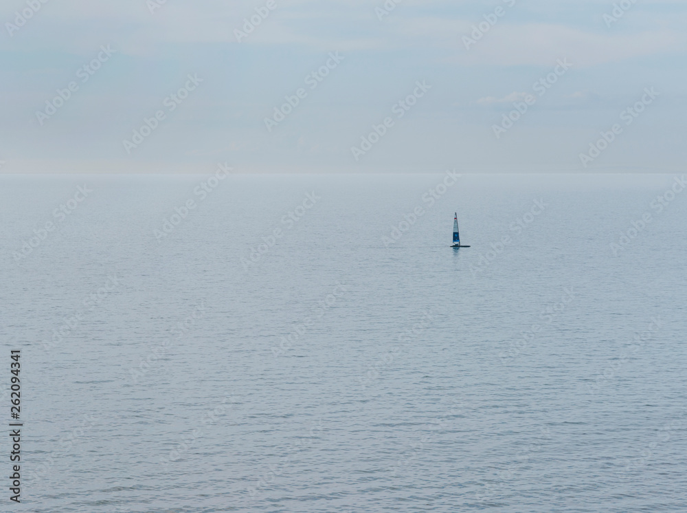 Sailing Boat in the Horizon
