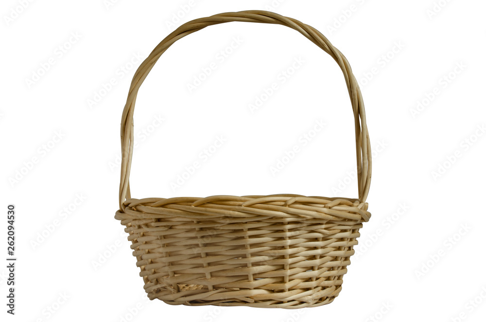 Wicker basket with handle on white background. Isolated object. Basket for gifts, flowers and fruit.