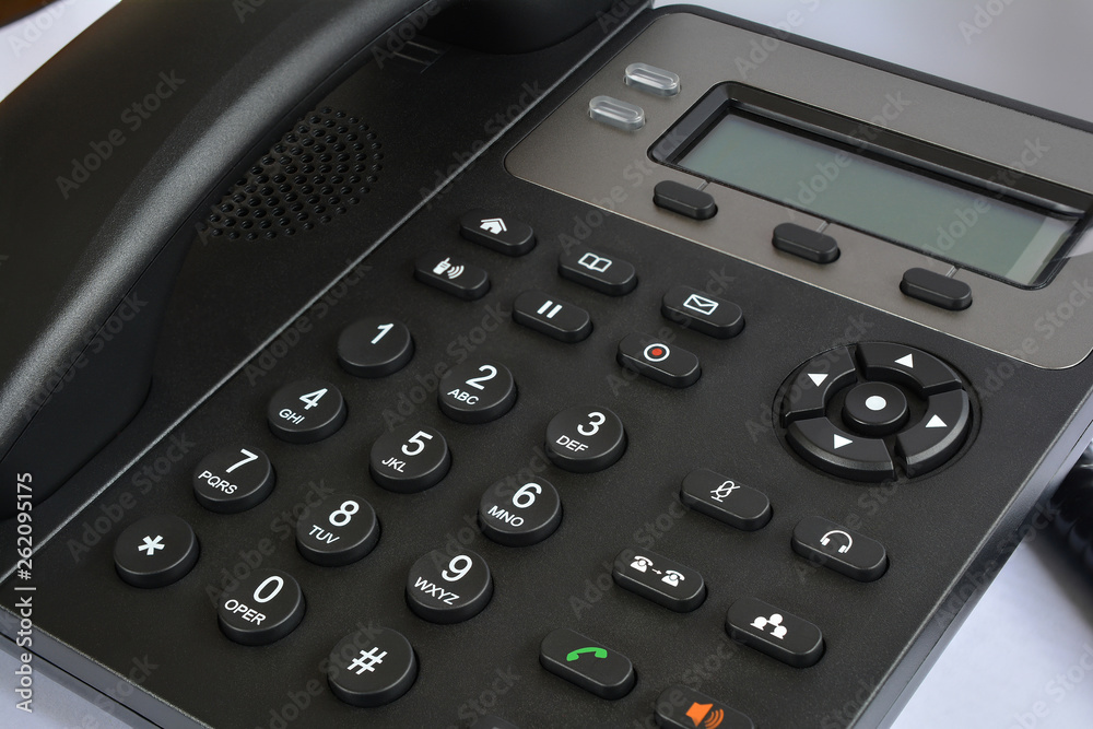 Telephone set with display and buttons. Modern phone for ip-telephony. Telephone set with display and buttons. Modern phone for ip-telephony.