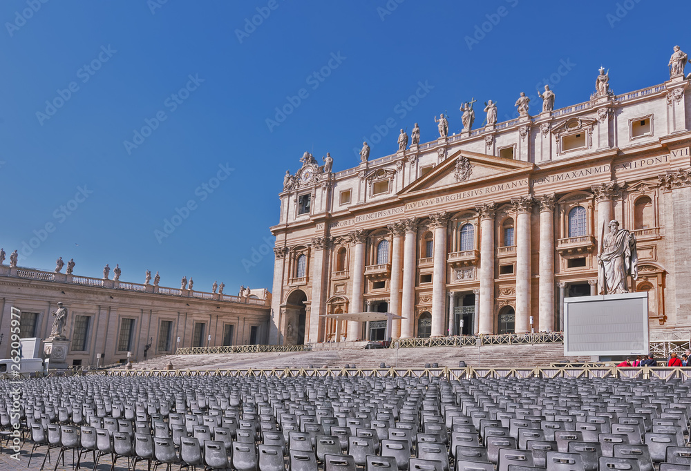 Vatican City, Rome - march, 2019: The Papal Basilica of St. Peter in the Vatican ( Basilica Papale di San Pietro), or simply St. Peter's Basilica - the papal enclave within the city of Rome. Vatican City, Rome - march, 2019: The Papal Basilica of St. Peter in the Vatican ( Basilica Papale di San Pietro), or simply St. Peter's Basilica - the papal enclave within the city of Rome.