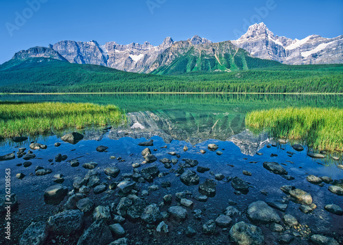 Waputik Mountains rise beyond Upper Waterfowl Lake, Banff National Park, Canada photo