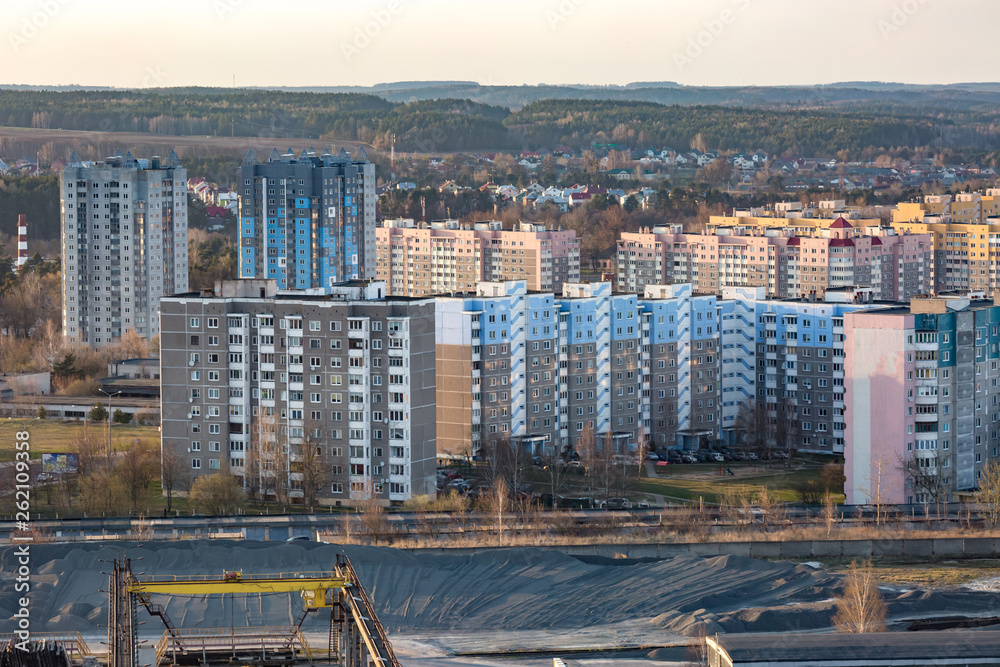 Fototapeta premium Panoramic view on new quarter high-rise building area urban development residential quarter in the evening from a bird's eye view
