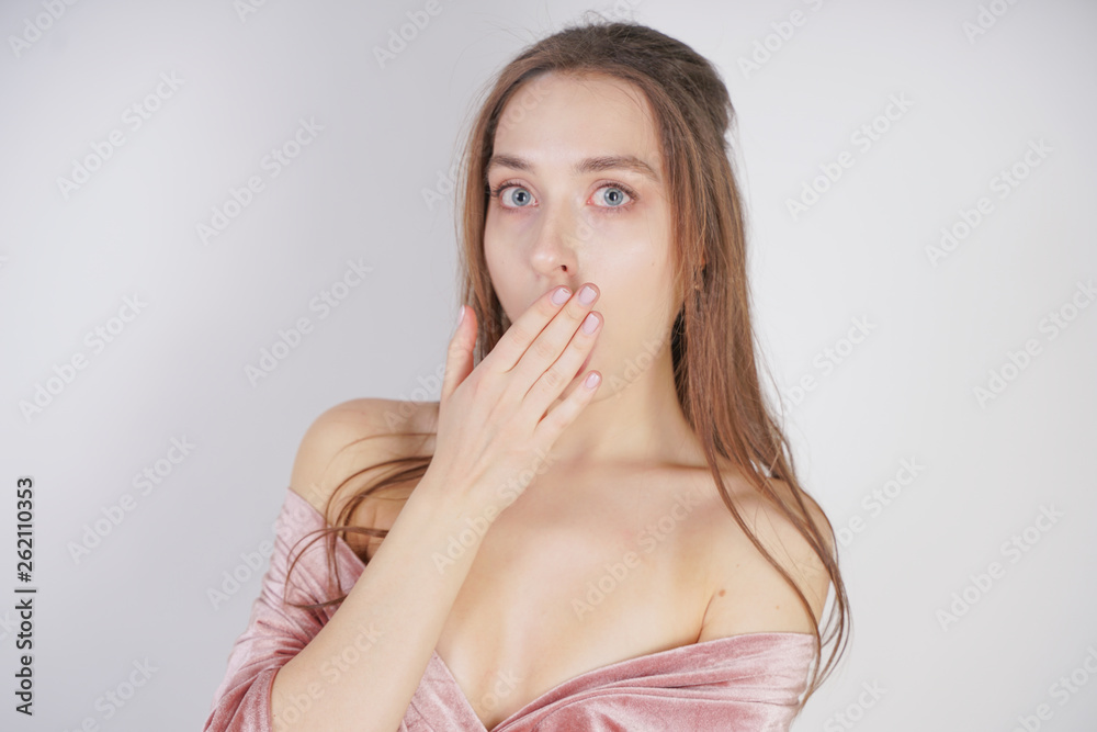 cute young caucasian girl sends air kiss on white background in Studio cute young caucasian girl sends air kiss on white background in Studio