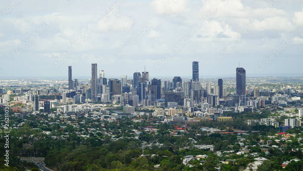 Panoramic view of large Brisbane city during cloudy day, taken from Mount Coot-tha lookout. Australia.