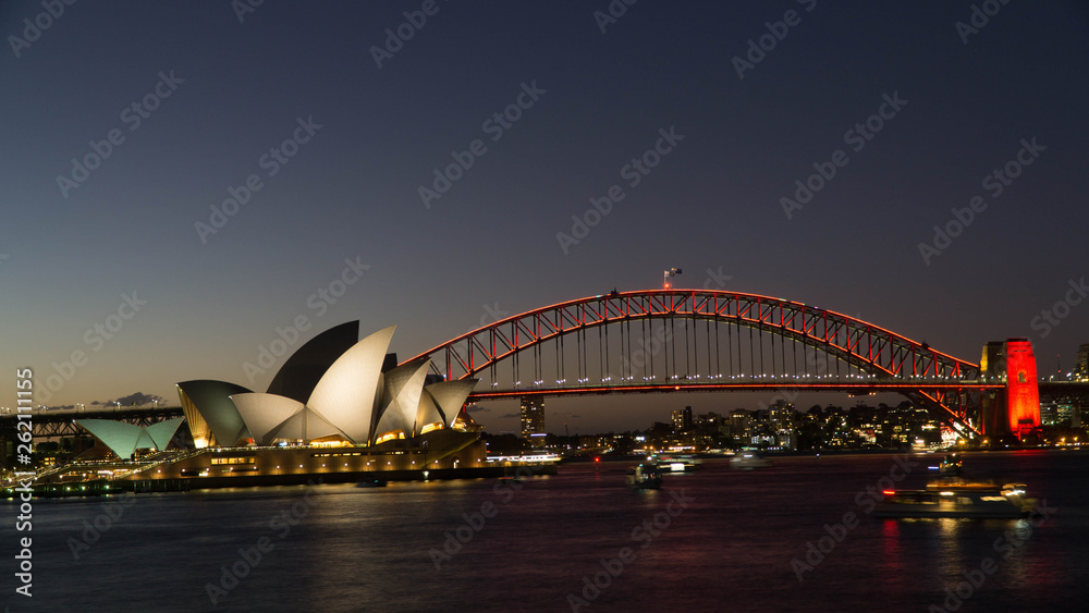 A Night view of the famous Sydney Opera House and the Harbour Bridge seen from Royal Botanical gardens, Australia