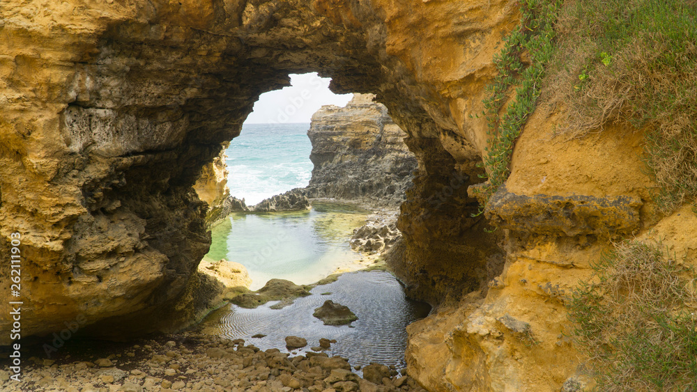 The Grotto - the hollowed out cave, natural stone arch with ocean behind, Australia