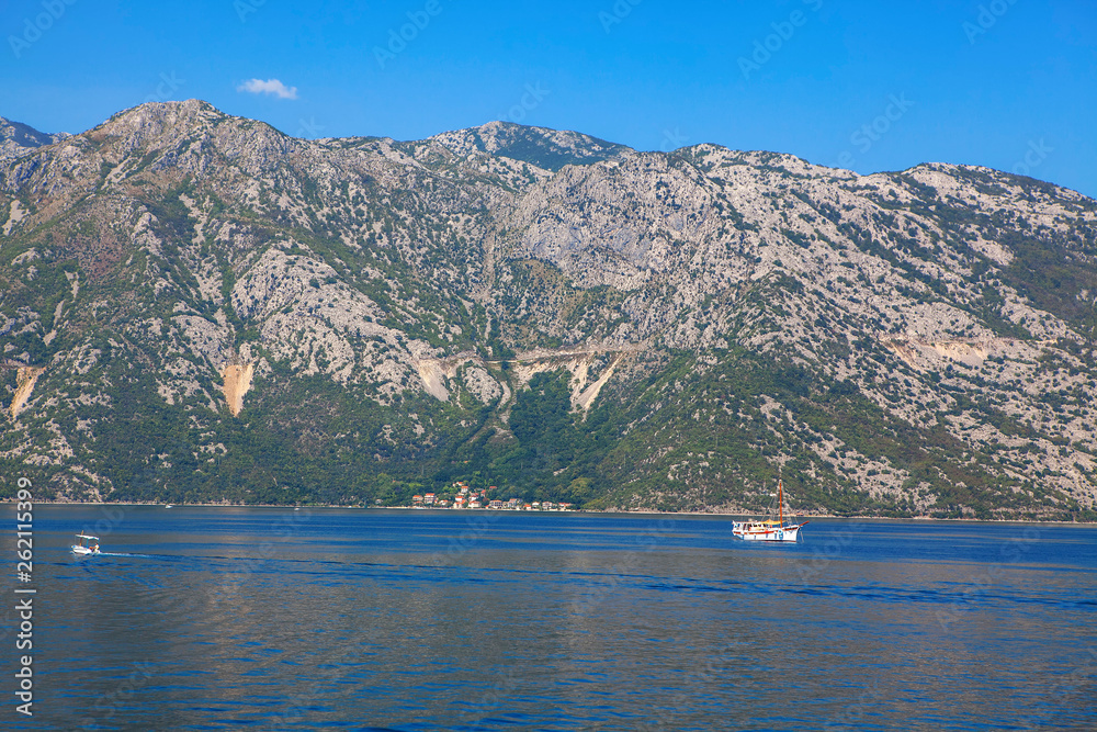 scenery with mountains and sailing boats 