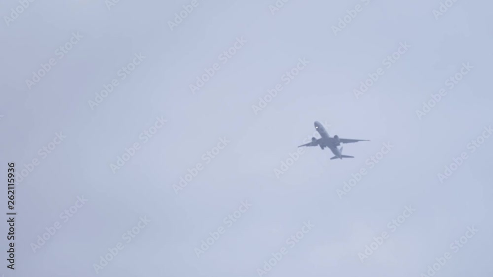 Airplane flying through cloudy weather and hide behind the bushes | SLOW MOTION